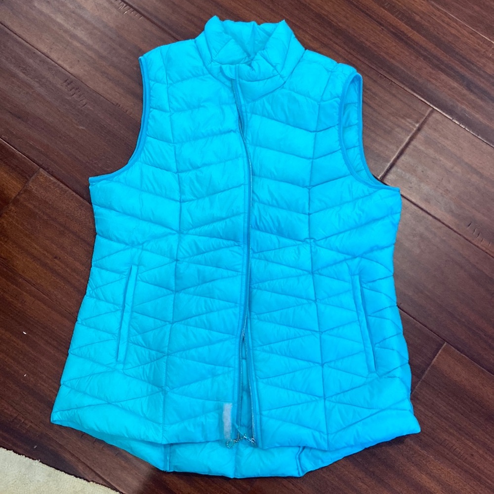 Brand new light blue puffer vest